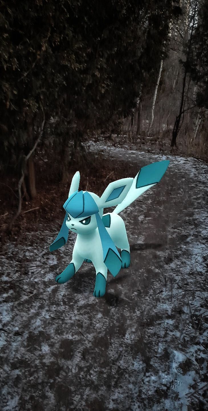 A cute ice fox creature gets into a battle stance in the forest