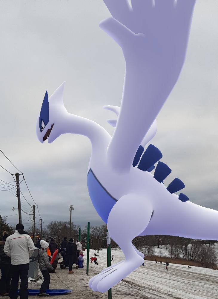 Lugia, a white, black, and blue psychic and flying pokemon.